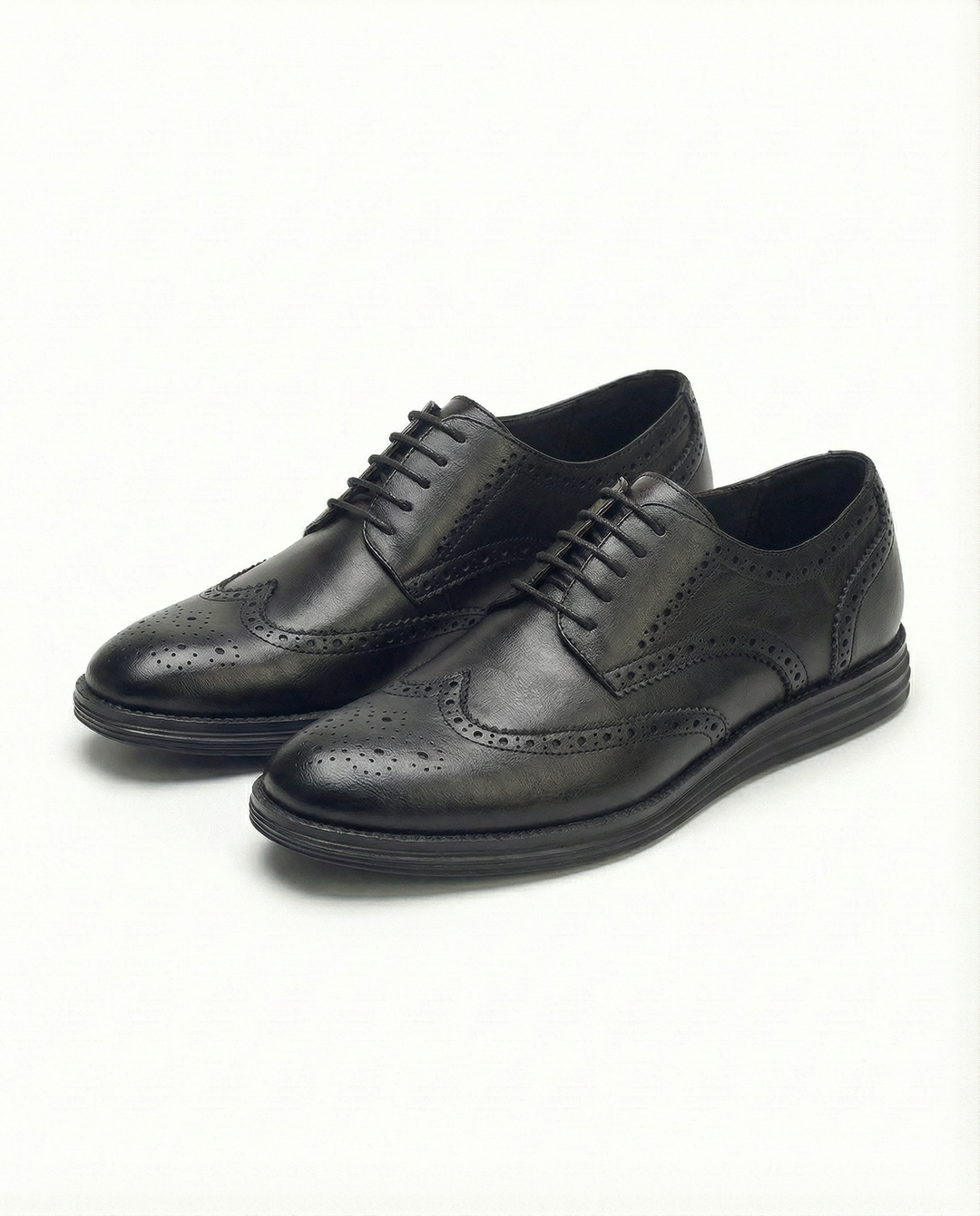 Elegant men's tan leather brogue Oxford dress shoes with intricate detailing for a sophisticated, classic style.