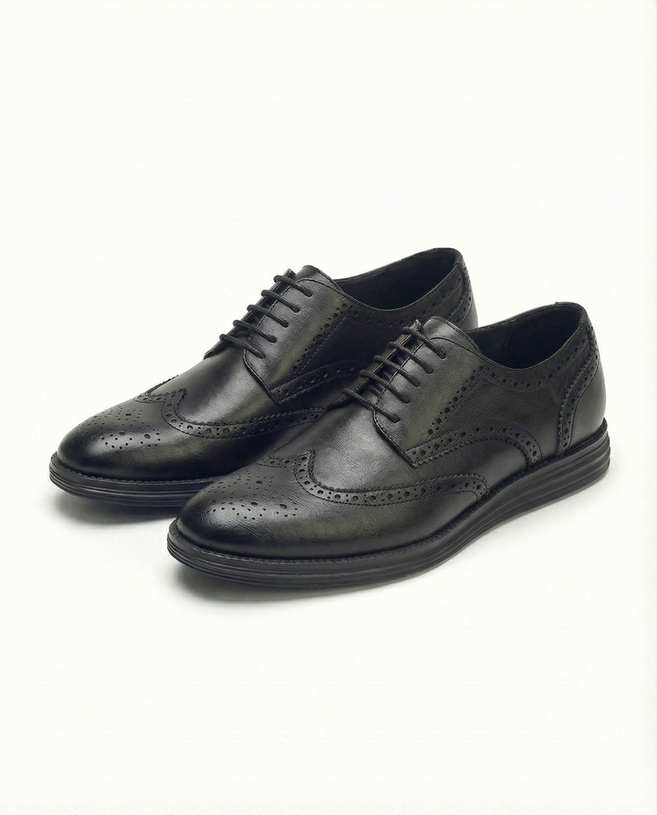 Elegant men's tan leather brogue Oxford dress shoes with intricate detailing for a sophisticated, classic style.