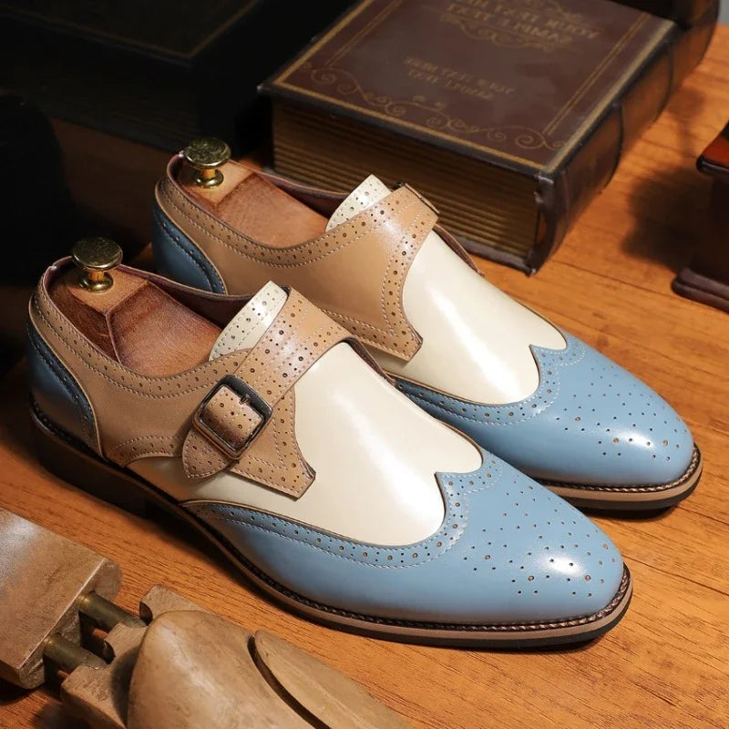 Side view of a men's leather monk strap wingtip brogue shoe, highlighting craftsmanship