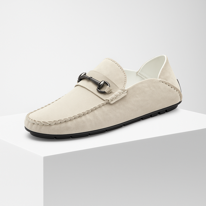 Top-down view of men's classic brown suede bit loafers, emphasizing the sleek design and texture