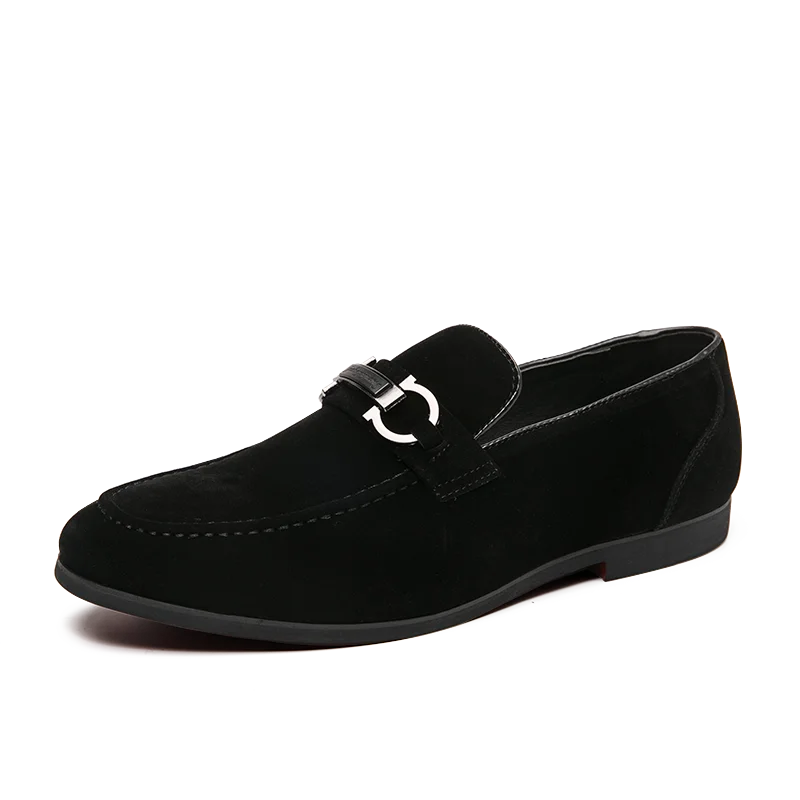 Detailed shot of the metal bit on a men's suede loafer, highlighting the craftsmanship.