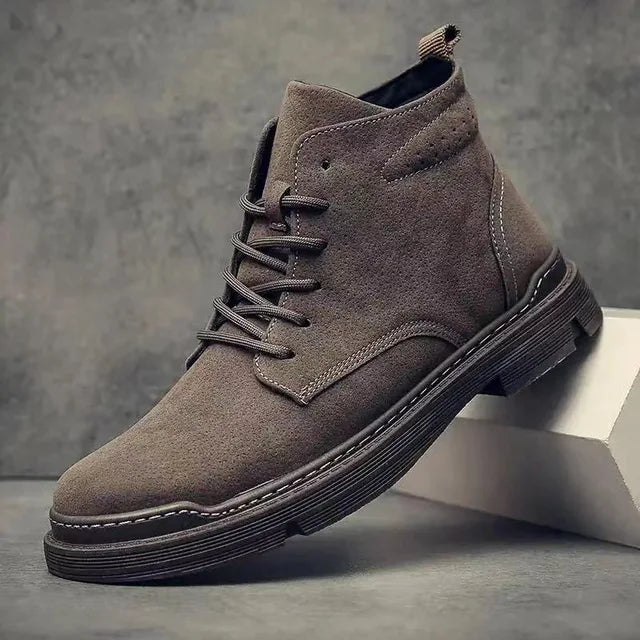 Men's classic brown suede leather lace-up boots, perfect for casual winter fashion footwear.