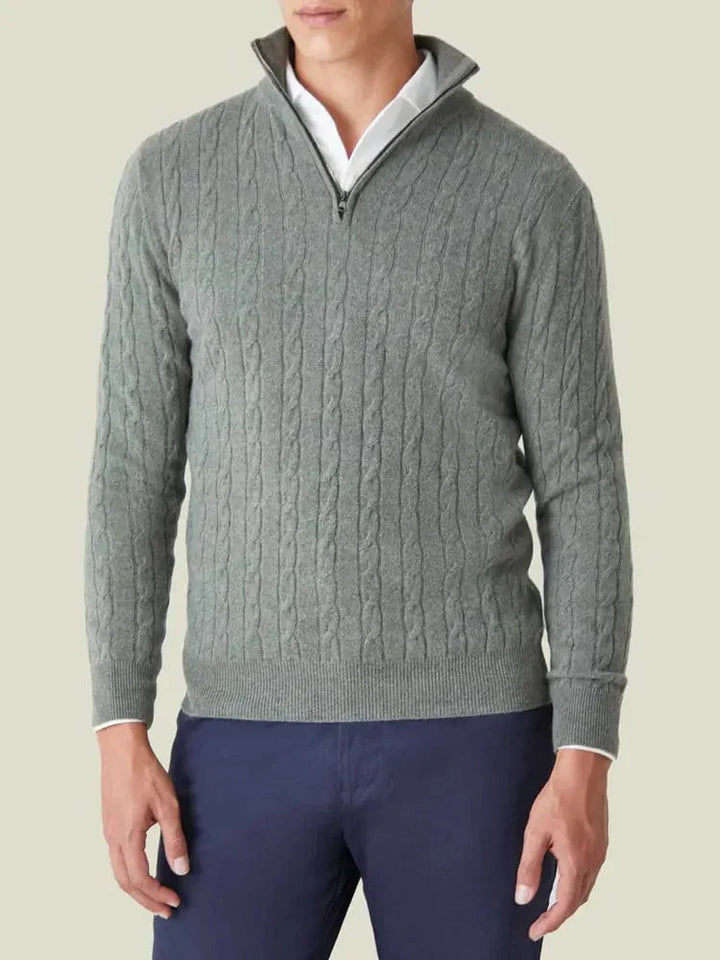 Front view of a men's fashionable cable knit half zip sweater, a staple piece for any man's spring wardrobe.
