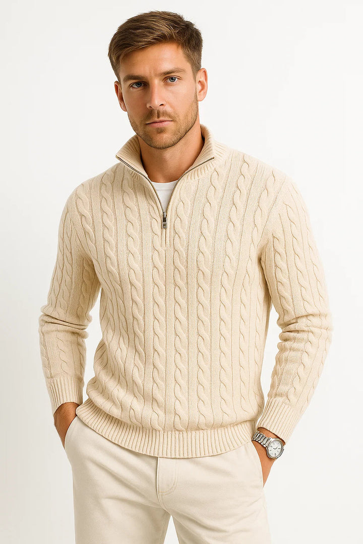 Detailed shot of the textured cable knit pattern on a men's black zip-neck sweater, comfortable and stylish.