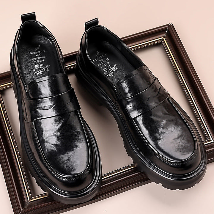 Comfortable men's classic brown penny loafers with chunky sole. Versatile slip-on shoes for casual to formal outfits.