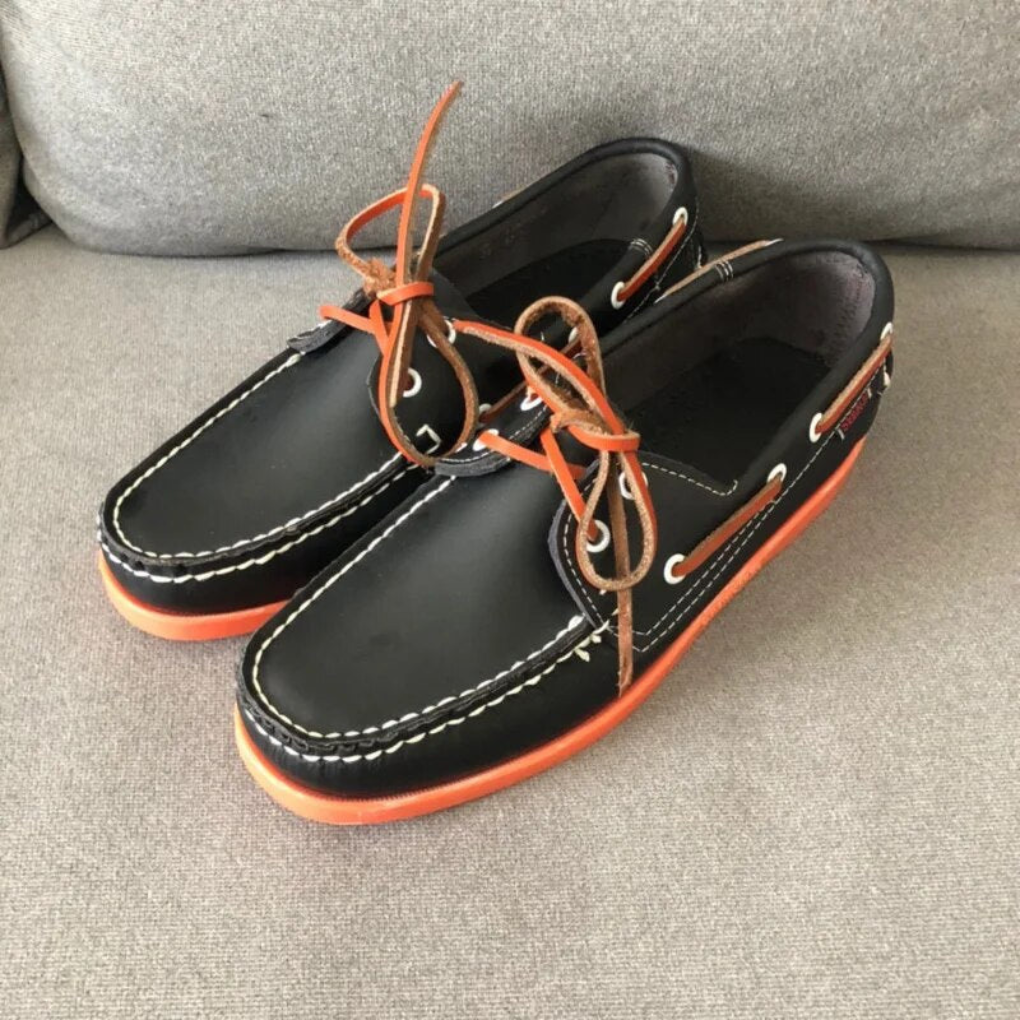 Comfortable men's boat shoes, classic lace-up design. Deck shoes for casual summer style and nautical adventures.