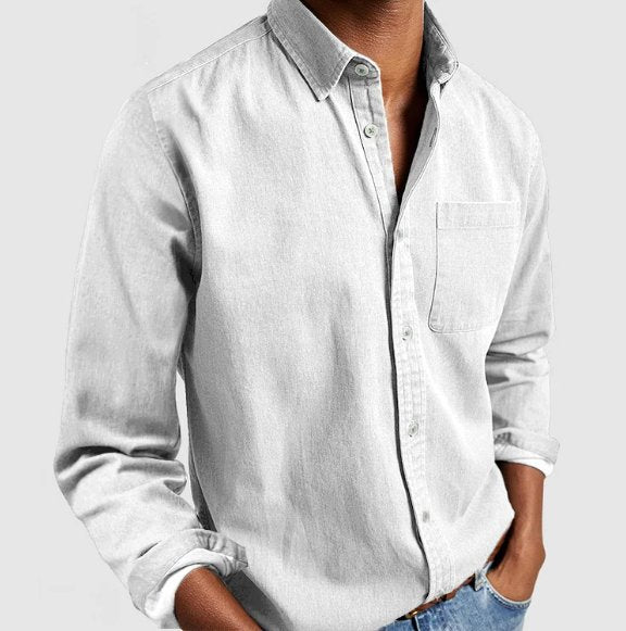 Timeless men's long sleeve denim button-down shirt, a classic piece for any casual or everyday outfit.