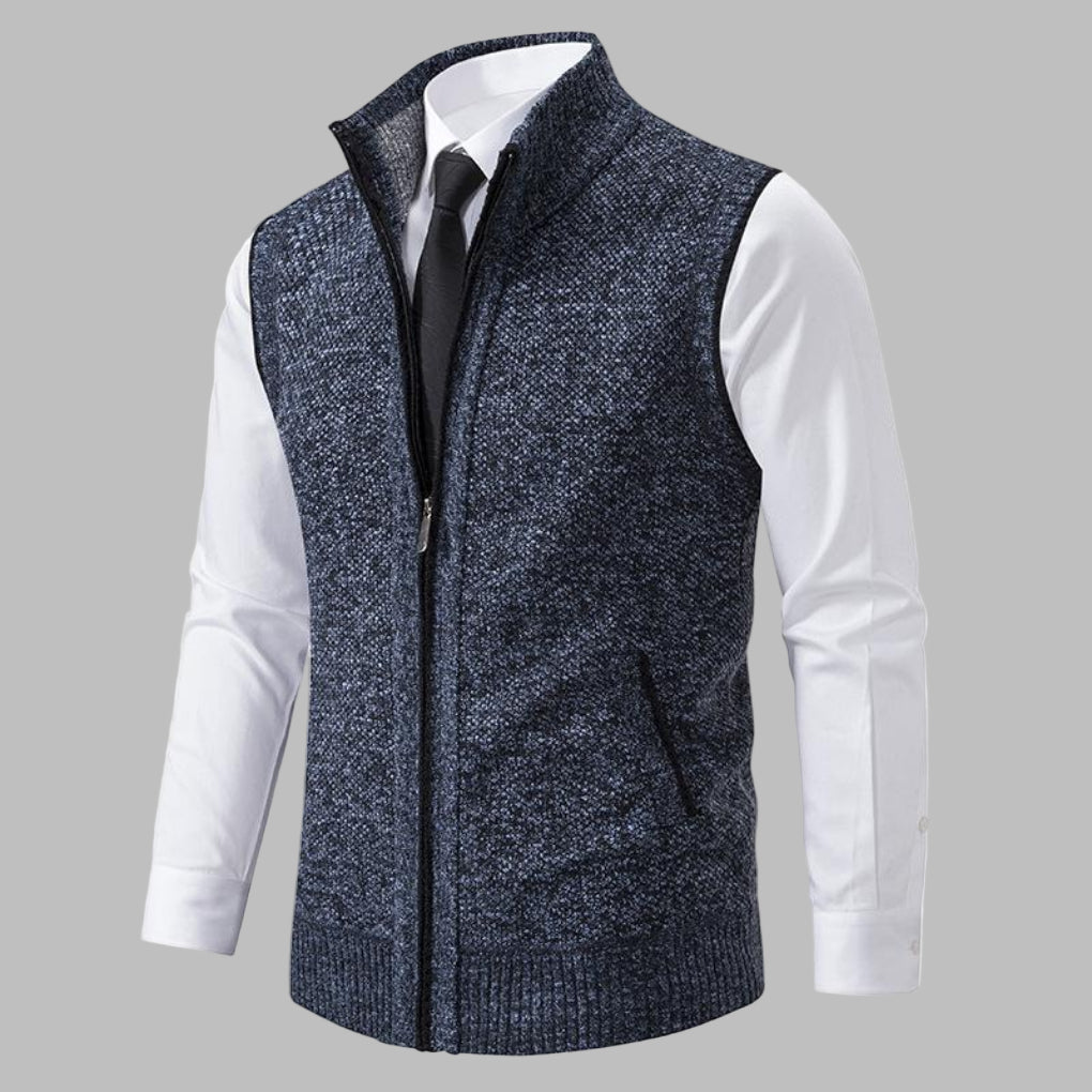 Men's classic full-zip vest in a dark color, perfect for versatile layering and men's fashion. Sleek sleeveless jacket.
