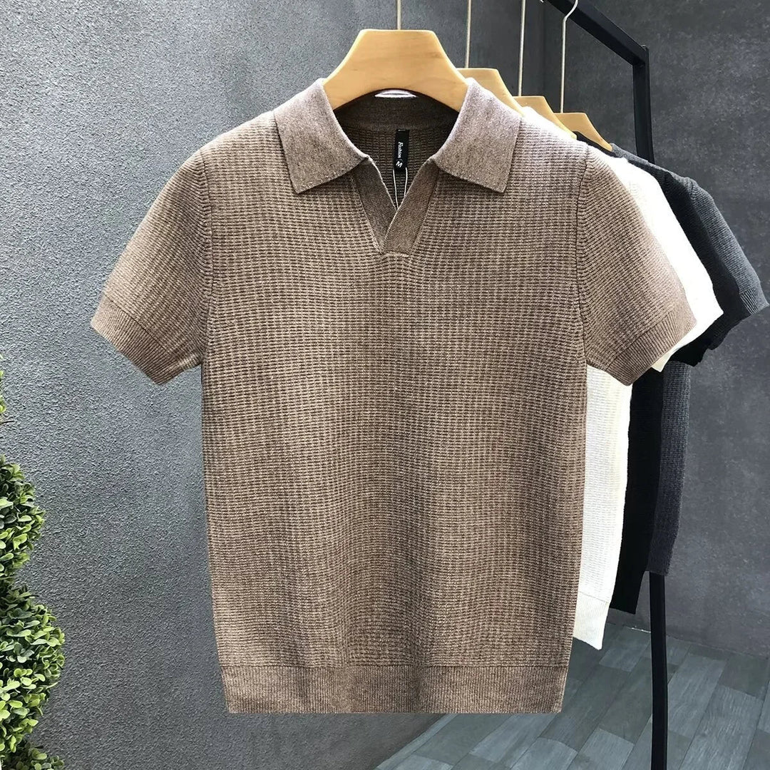 Men's classic knit polo shirt, soft knit fabric, short sleeve, open collar, perfect for smart casual style.
