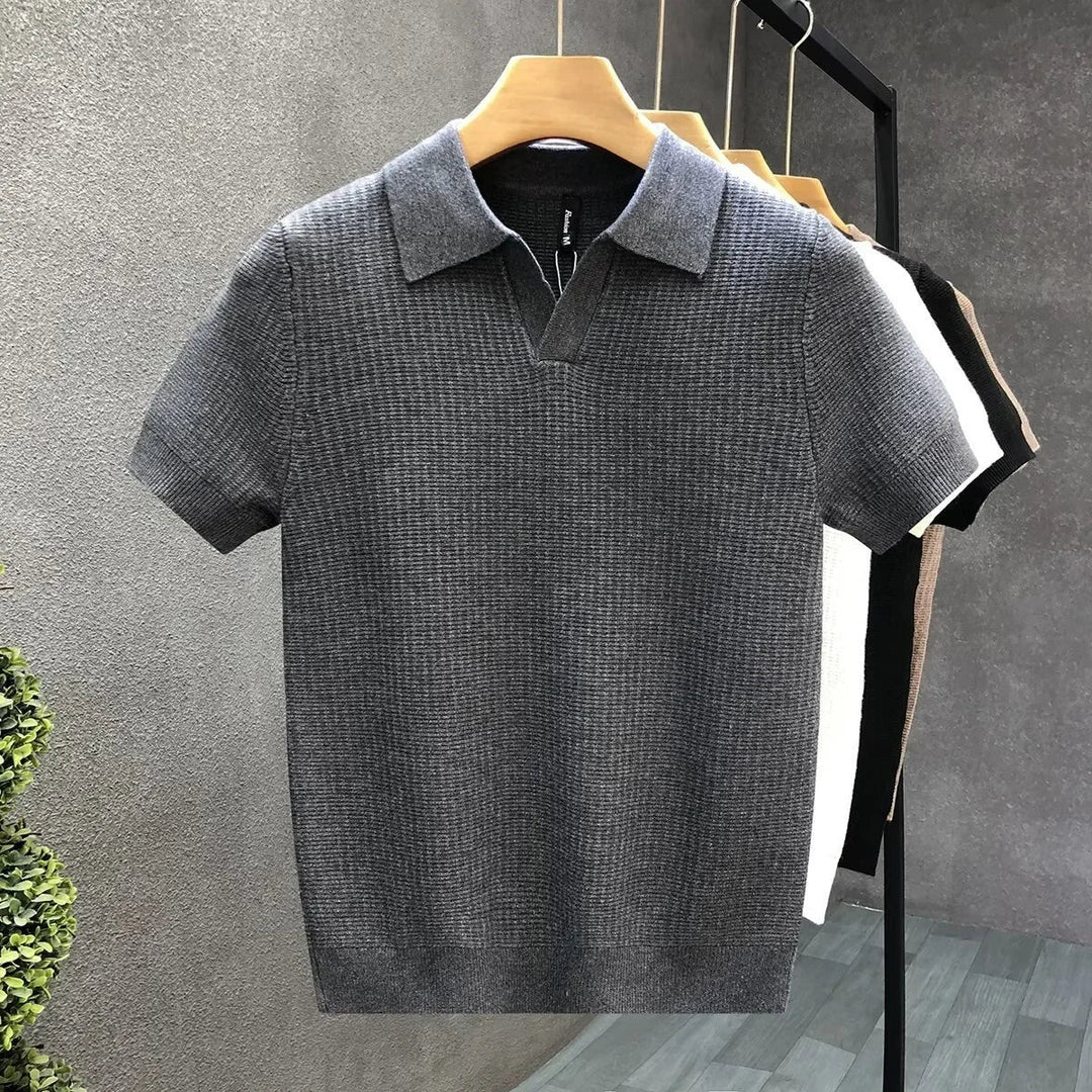 Breathable men's knit polo shirt with a stylish open collar and comfortable short sleeves for casual wear.