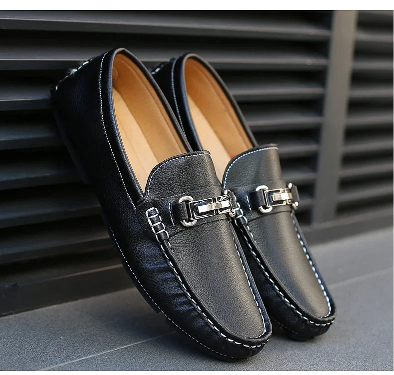 Men's Classic Leather Bit Loafers on a wooden floor, emphasizing their classic and sophisticated look