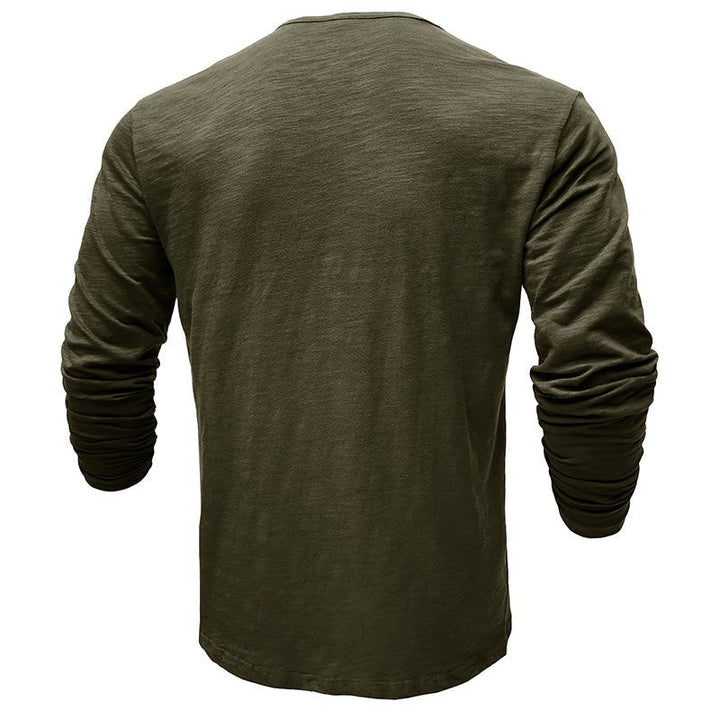 Folded men's long-sleeve henley, showcasing its neat and compact form.