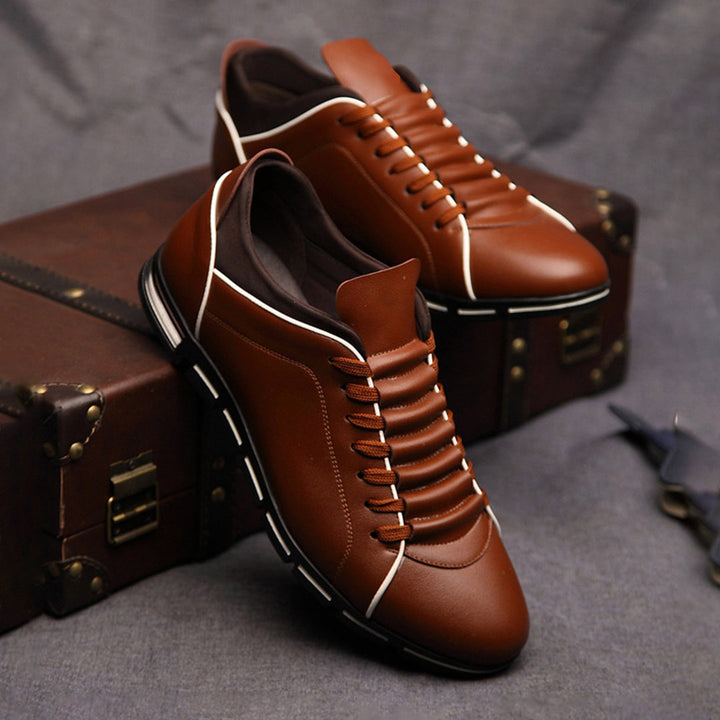Men's classic low-top sneakers for timeless style & everyday comfort.