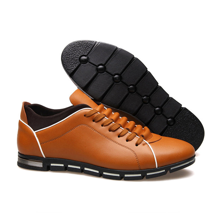Lace-up men's classic low-top sneakers, offering secure fit and timeless style for daily comfort.