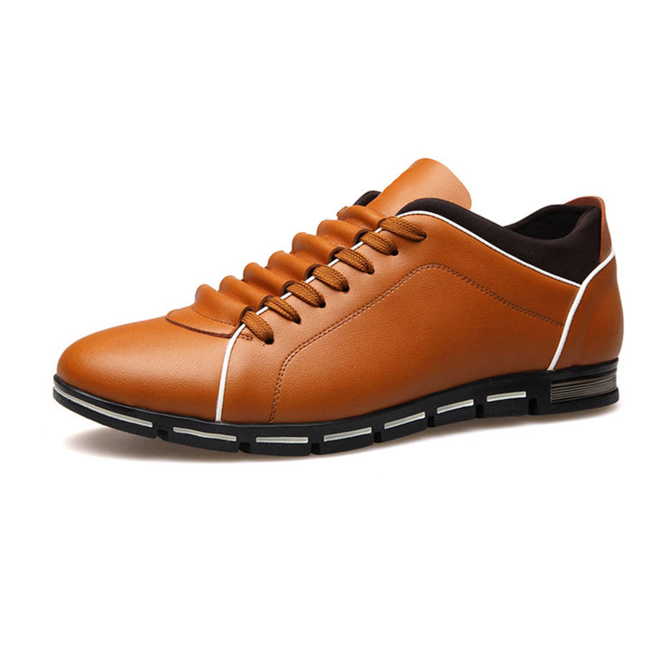 Sleek men's low-top sneakers in a classic design, providing comfort & versatile fashion for any occasion.