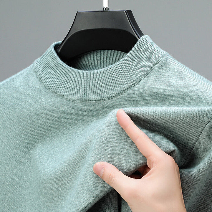 Stylish men's mock neck pullover sweater, classic long sleeve design for smart casual and everyday looks.