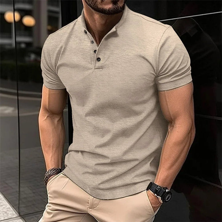 Stylish men's short sleeve Henley shirt, featuring a mandarin collar and button placket for casual wear.