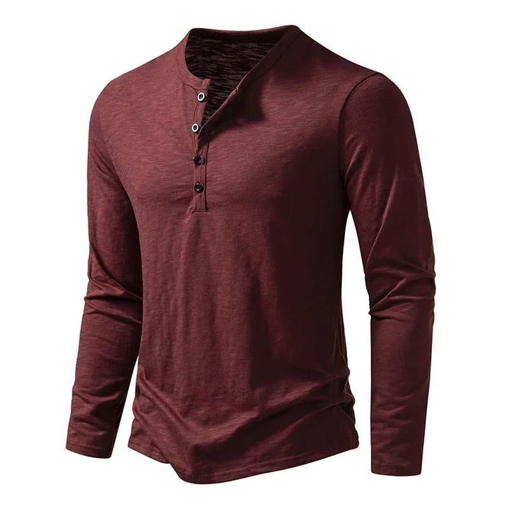 Classic men's henley top, slim fit long sleeve. A timeless piece for casual everyday wear.