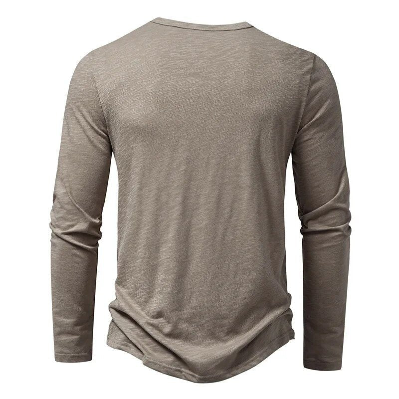 Versatile men's casual henley shirt, perfect for everyday wear & layering. Comfortable fit.