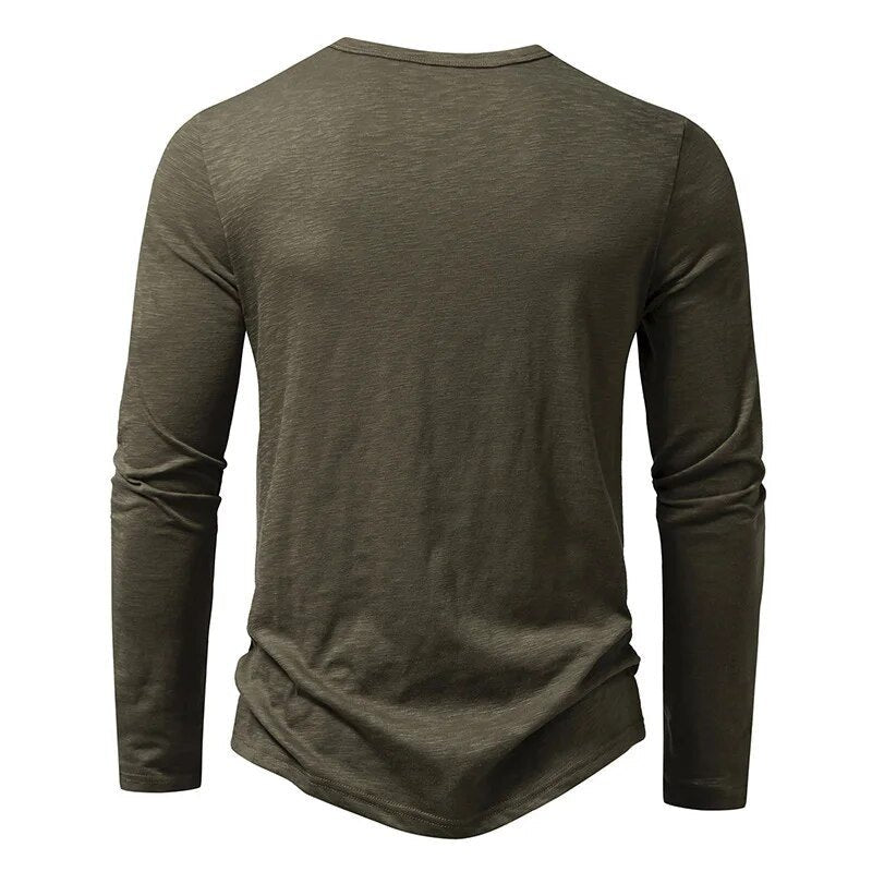 Men's long sleeve henley with button placket. Slim fit, ideal for casual everyday wear.