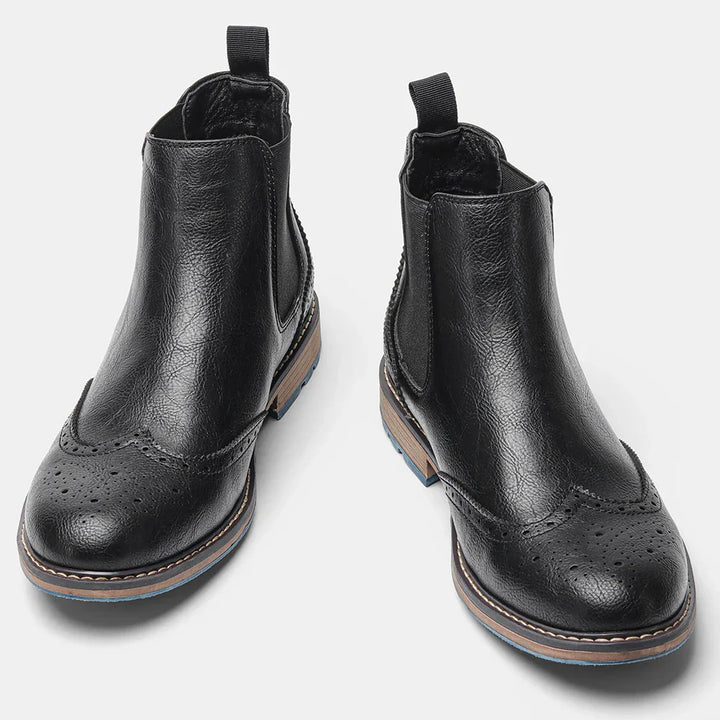 Pair of classic mens slip-on boots, ideal for versatile fashion and lasting comfort