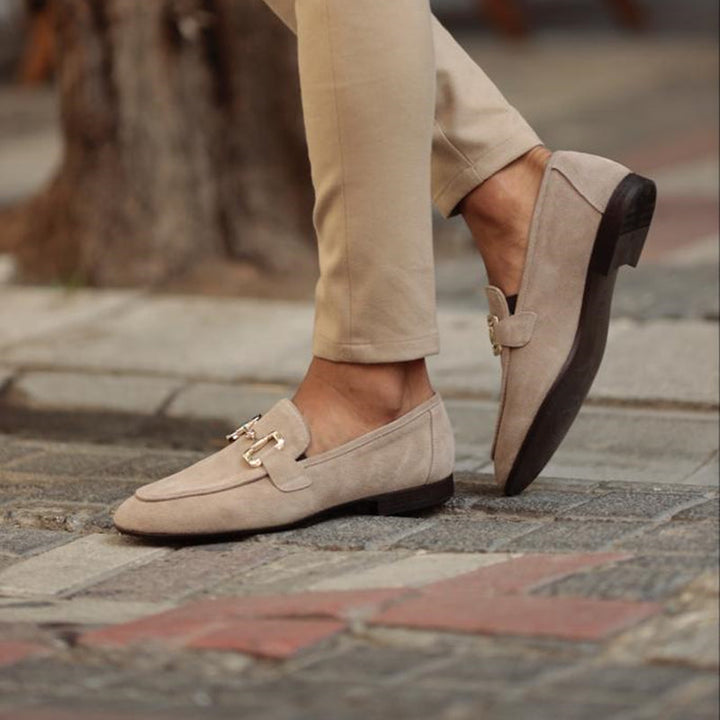 Formal men's horsebit slip-on shoes for office or events, offering comfort and easy wear.