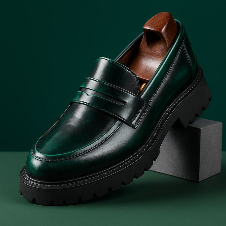 Stylish men's classic penny loafers with slip-on design, offering comfort and good traction for everyday wear.