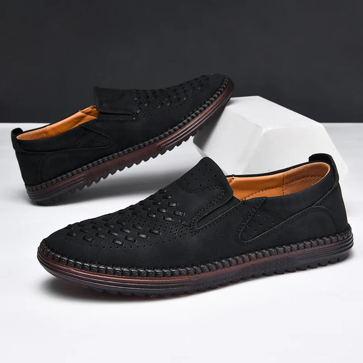Navy blue men's casual loafers, perfect for a relaxed yet sophisticated look.