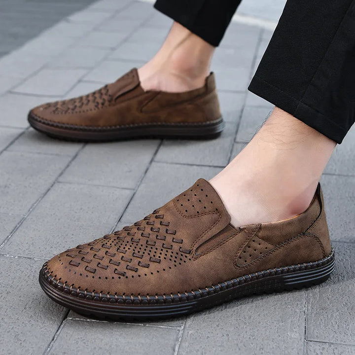 Breathable men's casual loafers in light blue, perfect for warm weather comfort.