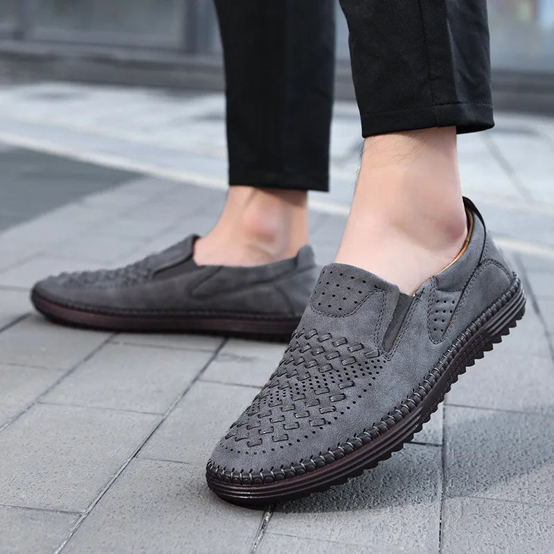 Men's classic slip-on loafers on a white background, highlighting product details and style.
