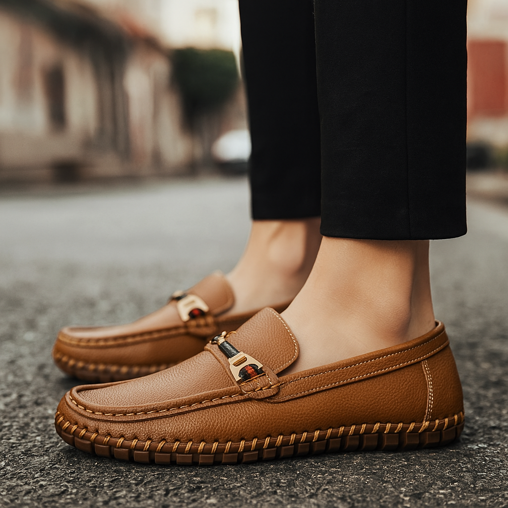 Side view of men's navy blue leather bit loafers, showcasing elegant design and quality craftsmanship