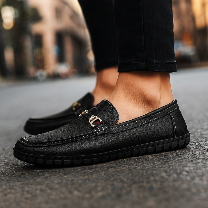 Detailed image of the distinctive bit hardware on men's genuine leather loafers, sophisticated men's shoes