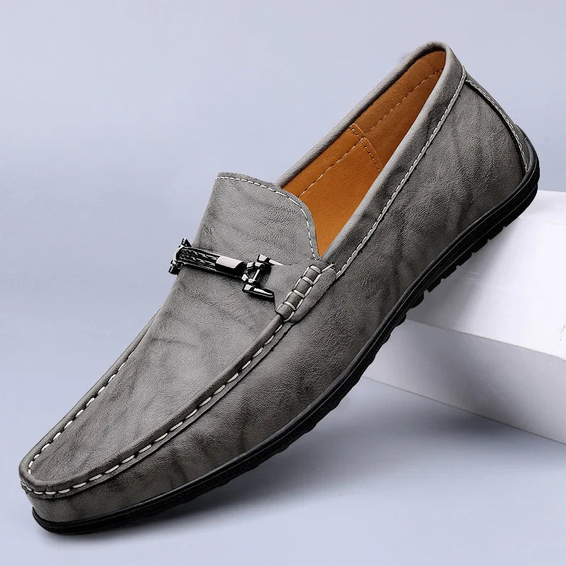 Formal men's slip-on bit loafers in rich brown leather, comfortable and chic