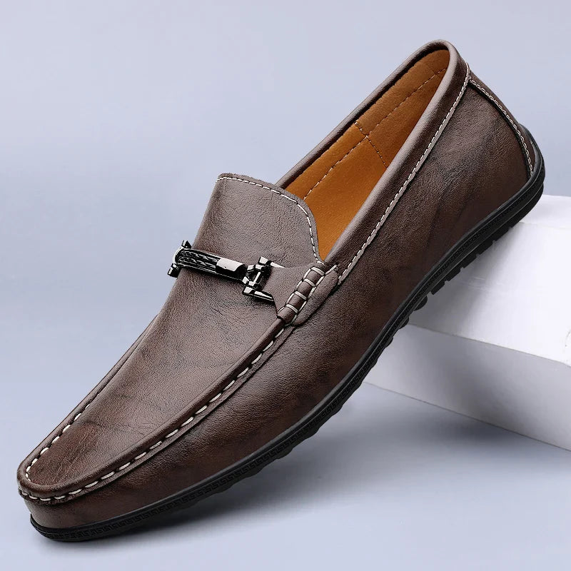 Men wearing classic black leather bit loafers with tailored trousers