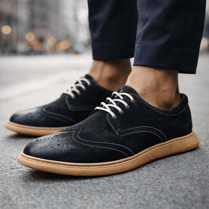 Classic men's lace-up dress shoes in a rich brown finish, providing comfort & style for any occasion.