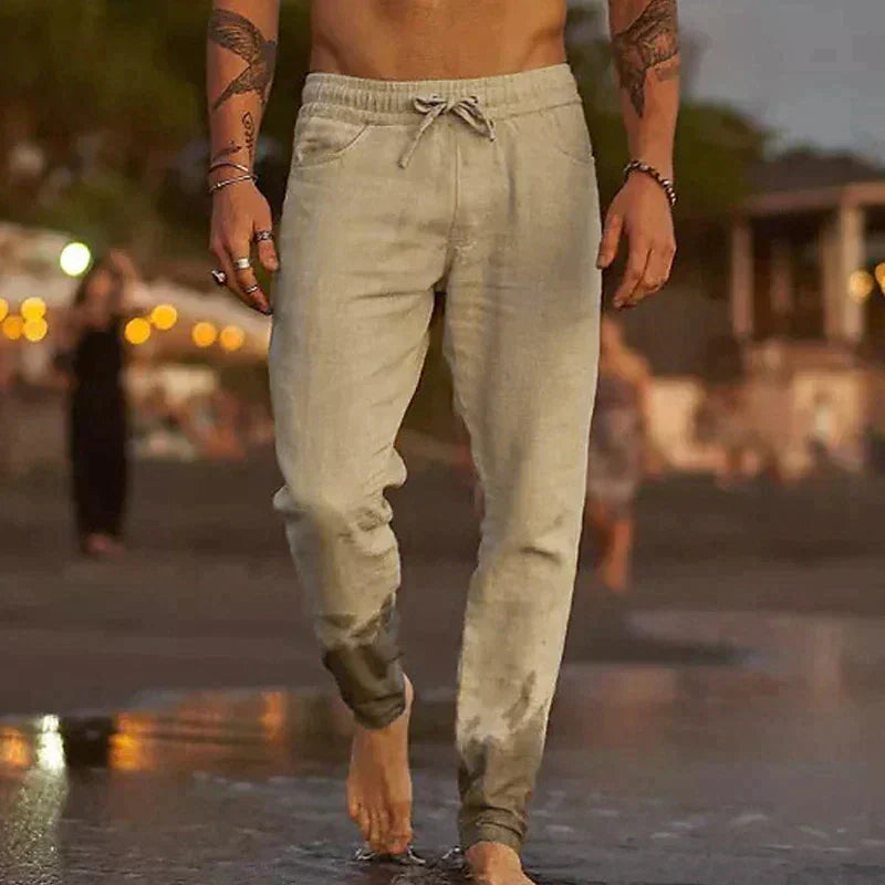 Men's comfortable drawstring jogger pants for a relaxed fit, ideal for lounge wear or active lifestyle. Casual chino style.