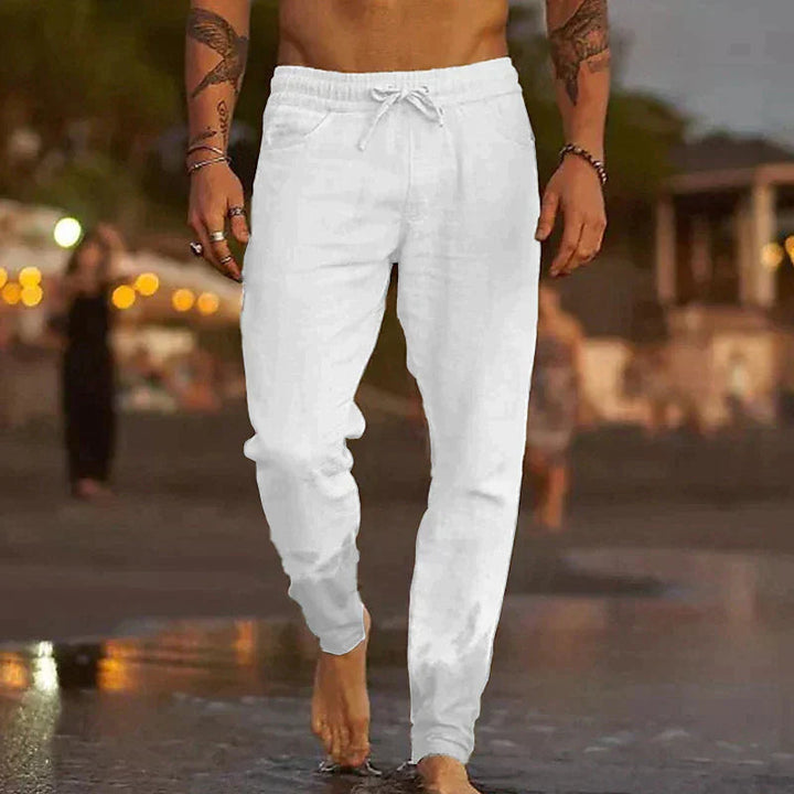 Men's athletic jogger pants with adjustable drawstring. Comfortable cuffed design, ideal for active lifestyle & casual wear.