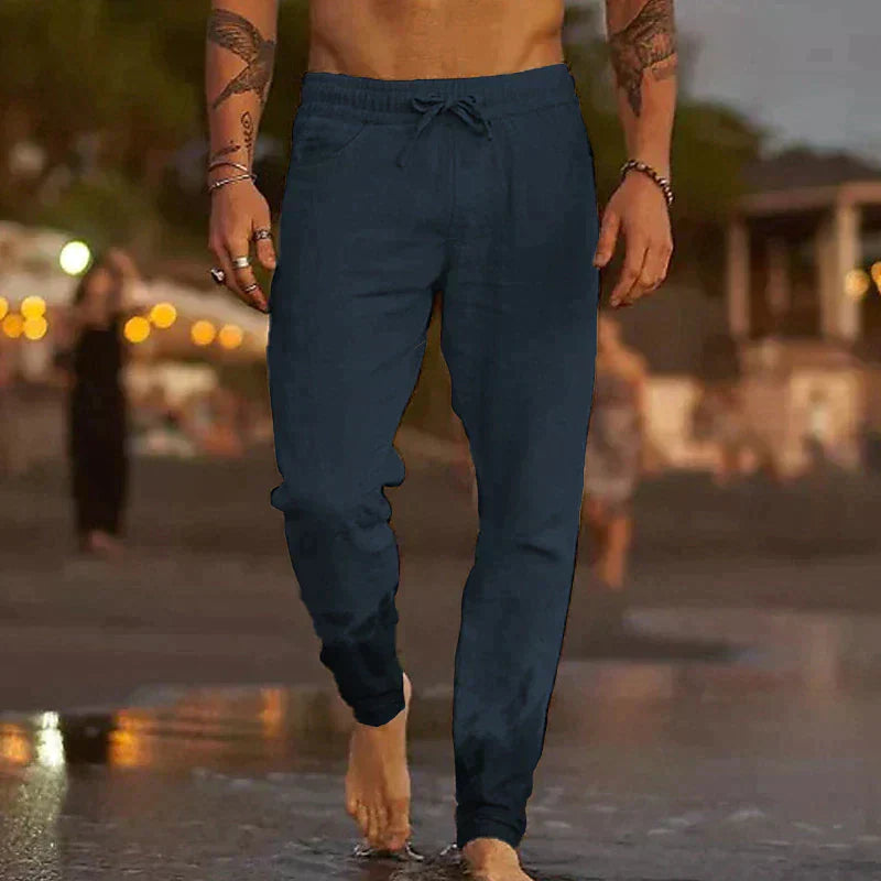 Comfortable men's drawstring jogger pants with cuffed ankles. Relaxed fit casual trousers for active or lounge wear.