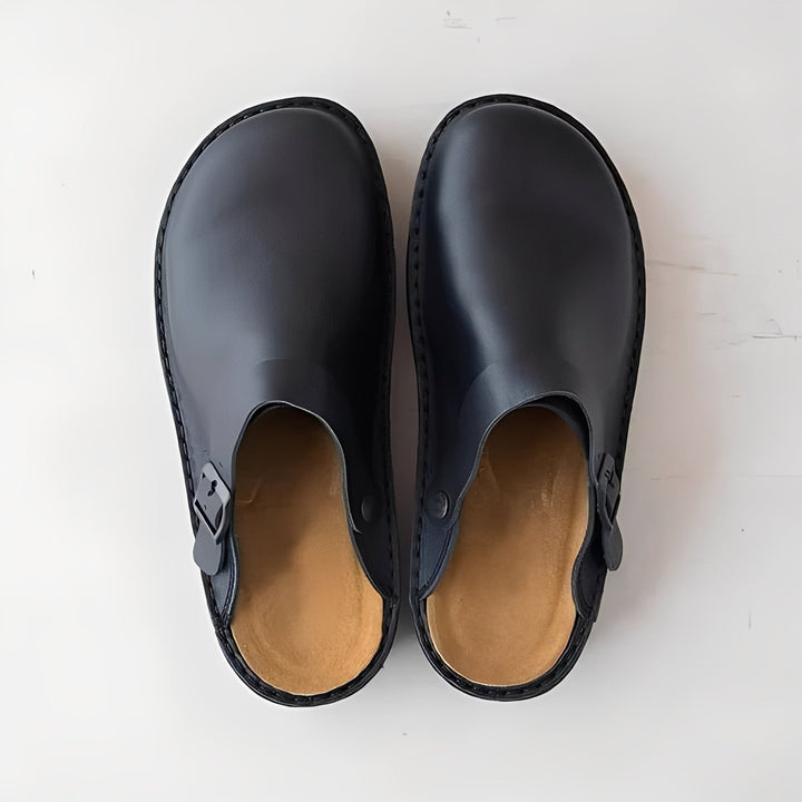 Men's comfortable house slippers with supportive removable insole for ultimate indoor foot comfort.
