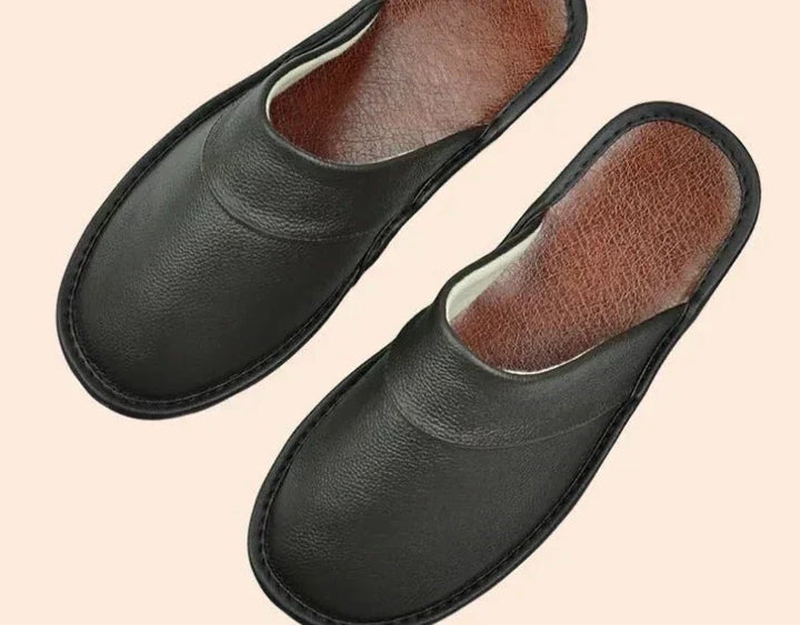 Man wearing cozy slip-on house shoes. Perfect men's casual slippers for relaxed home comfort.