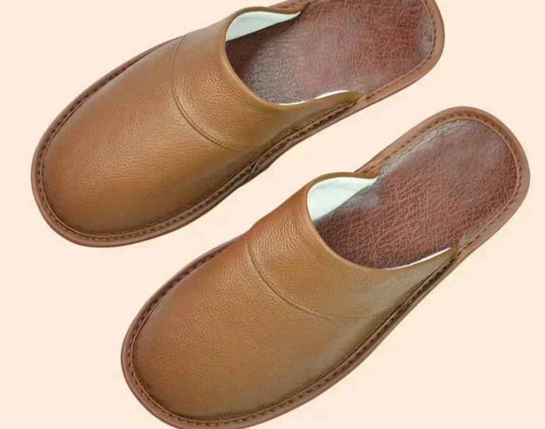 Side view of a men's slip-on slipper, showcasing easy wear design and comfortable indoor footwear.