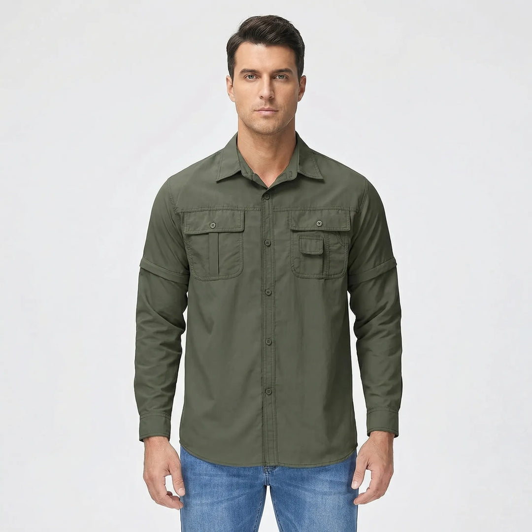 Versatile men's outdoor shirt with zip-off sleeves, shown as a long-sleeve for sun protection during travel.