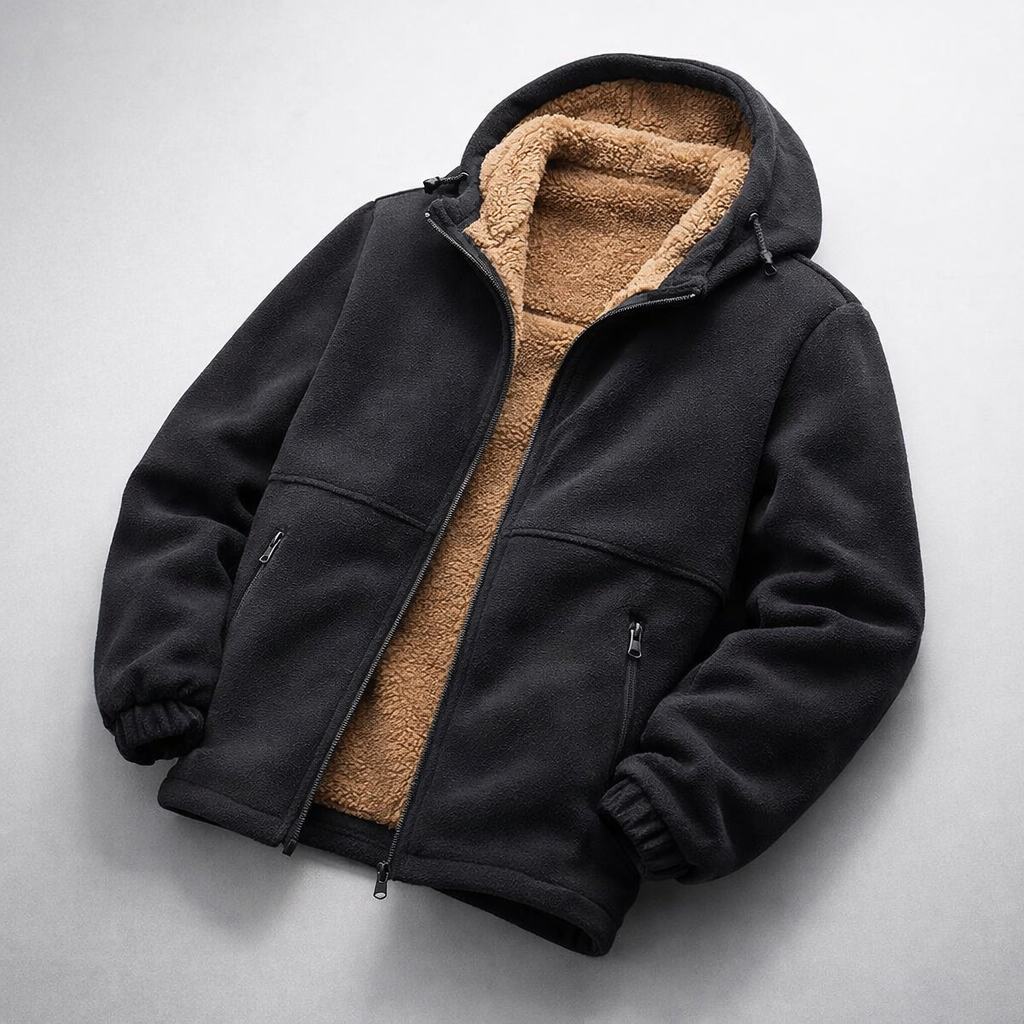 Detail of the durable zipper on a warm men's fleece jacket, perfect for cold weather.