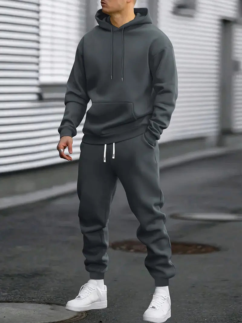 Athletic men's jogger set with a relaxed fit sweater, ideal for comfortable lounge wear