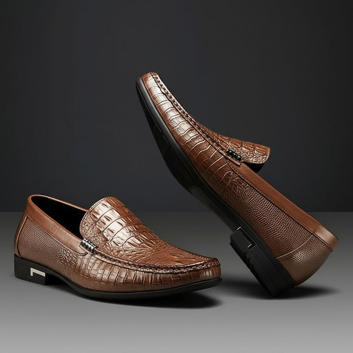Fashion-forward men's crocodile embossed slip-on loafers. Comfortable and stylish dress shoes for modern men's fashion.