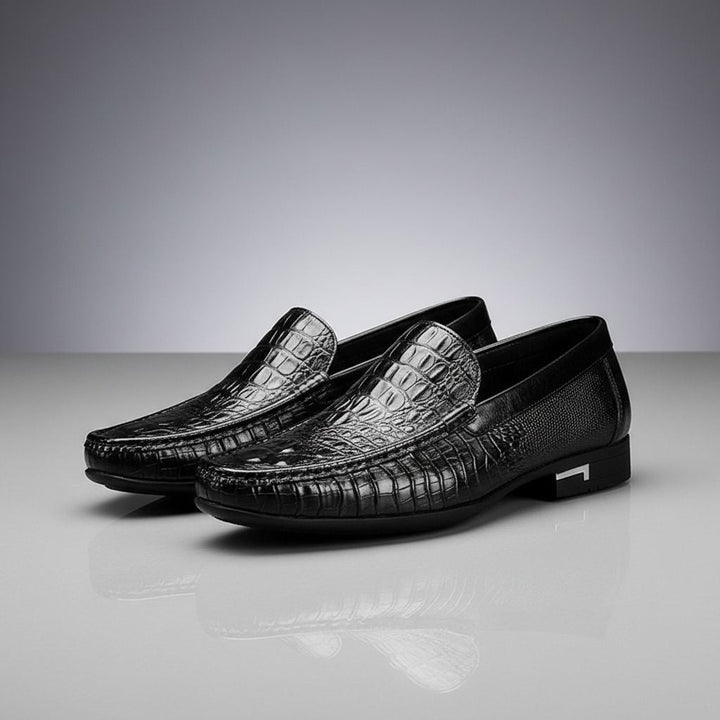 Dressy men's crocodile embossed slip-on loafers. Versatile professional footwear, suitable for any formal or casual occasion.