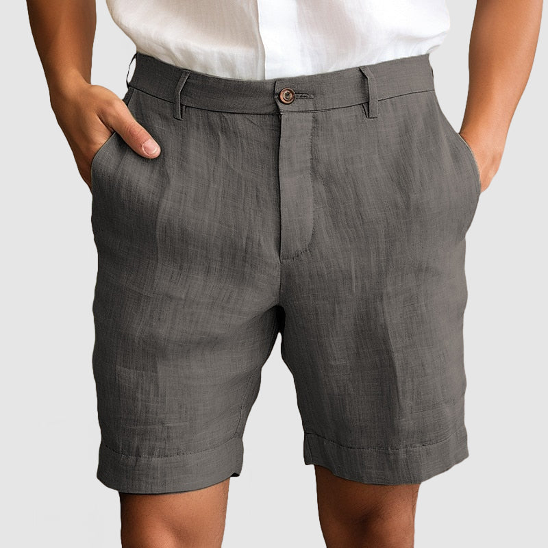 Stylish men's cuffed flat front shorts, perfect for a comfortable, smart-casual summer look.