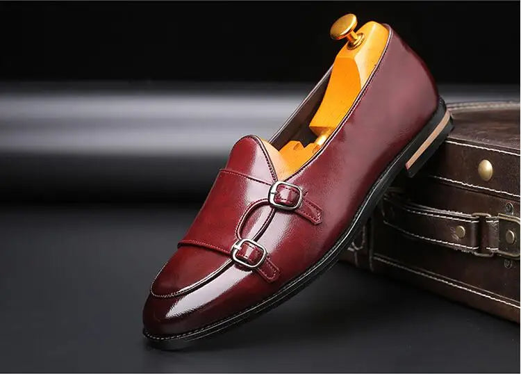 Front view of men's double buckle monk strap loafers, rich leather texture