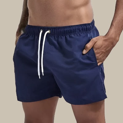 Multi-purpose men's drawstring shorts for swimming, sunbathing, and active summer lifestyles.