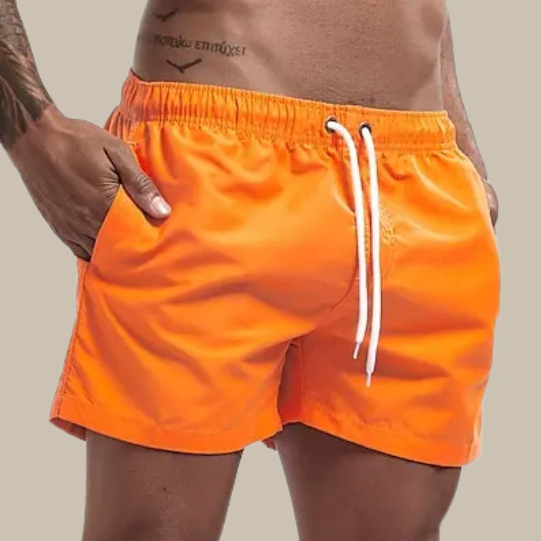 Comfortable men's drawstring swim trunks, perfect for relaxed beachwear and summer fashion.